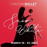 an image with a red background showing a female ballet dancer seated. She is wearing a long black dress. She is looking away from the frame and holding a mirror. The words Carolina Ballet Snow White March 10-27, 2022 are displayed across the image in white text