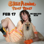 An image of Chris Fleming he is seated on the floor seen wearing all orange jumpsuit with his arm around a shaggy dog. The words Chris Fleming Tricky Tricky are above him in orange text. Below that the words Feb 17 Duke Energy Center Raleigh are in black text