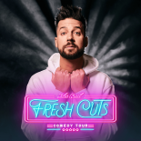 a photo of John crust he is standing against a black background with white haze behind his head. he is shown wearing a white hoodie with his hands grasped around the neckline. the words John crust fresh cuts comedy tour are across his chest in bright pink neon design 