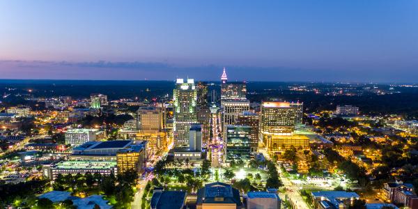 A downtown view of the city of raleigh at night